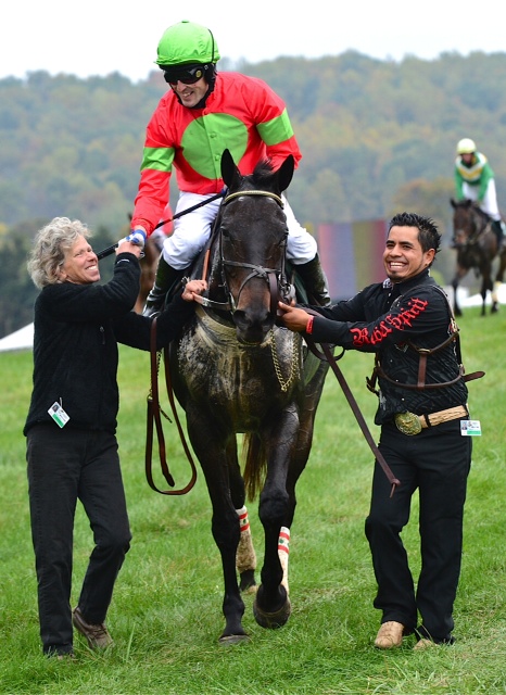 Headed to the Winner's Circle, Dawn Williams congratulates Kieran Norris on his win on Foyle in the International Gold Cup. Photo courtesy Douglas Lees.