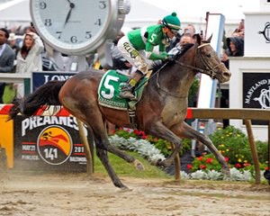 Exaggerator's win in the Preakness (shown here from Anne Eberhardt) and Nyquists's Derby win helped boost interest and betting handle in the month of May