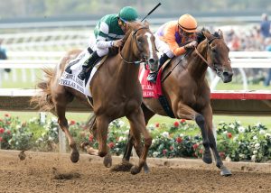 Hronis Racing's Stellar Wind and jockey Victor Espinoza, left, overpower Beholder (Gary Stevens), right, to win the Grade I, $300,000 Clement L. Hirsch Stakes, Saturday, July 30, 2016 at Del Mar Thoroughbred Club, Del Mar CA. © BENOIT PHOTO